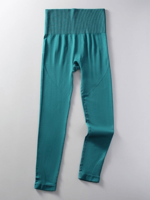 Women's seamless high waist yoga leggings SF0126 in teal, made from nylon and spandex for comfort and mobility.